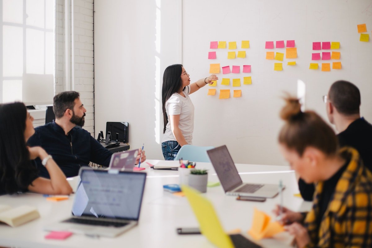 Business owner planning marketing strategy with the BRANDLUF team